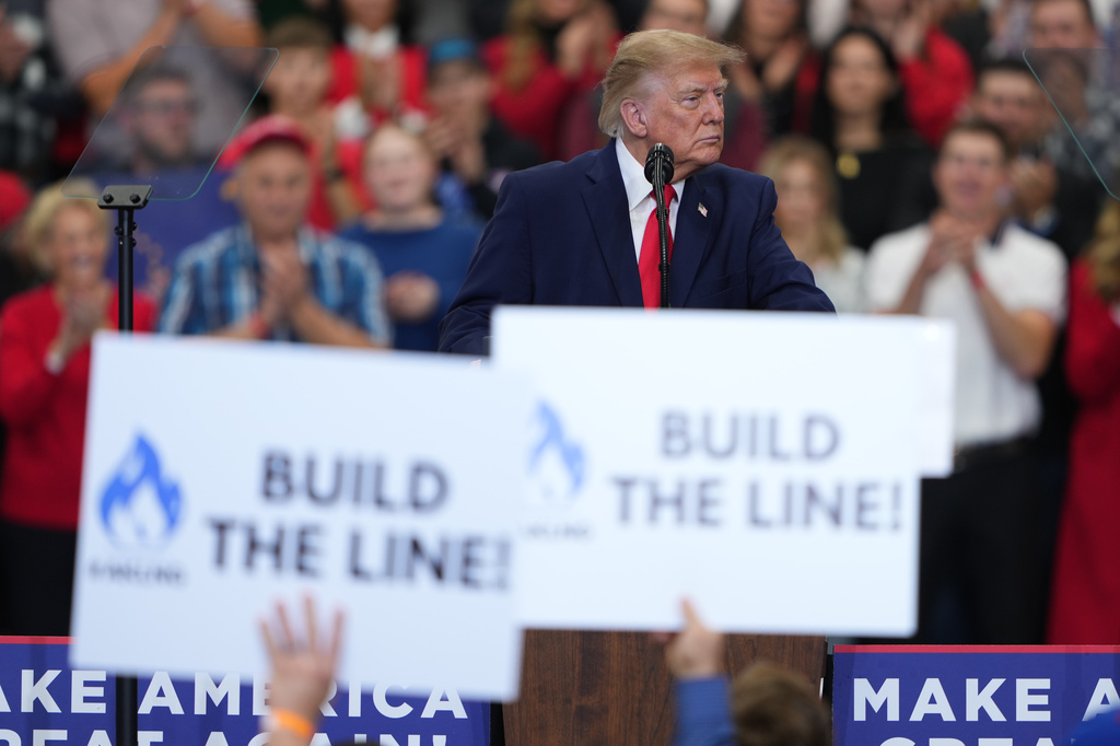 President Donald Trump speaks about the proposed Alaska LNG project at a campaign rally at the Curtis D. Menard Memorial Sports Center, Tuesday, Oct. 13, 2026, in Wasilla, Alaska. (AP Photo/Lindsey Wasson)