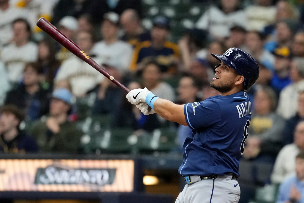 Tampa Bay Rays' Jonathan Aranda hits a solo home run during the first inning of a baseball game against the Milwaukee Brewers, Tuesday, March 31, 2026, in Milwaukee. (AP Photo/Aaron Gash)