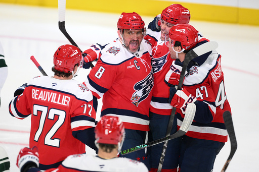 Washington Capitals left wing Alex Ovechkin (8) celebrates his goal with teammates during the third period of an NHL hockey game against the Minnesota Wild, Friday, Oct. 17, 2025, in Washington. (AP Photo/Nick Wass) Washington Capitals left wing Alex Ovechkin (8) celebrates his goal with teammates during the third period of an NHL hockey game against the Minnesota Wild, Friday, Oct. 17, 2025, in Washington. (AP Photo/Nick Wass)