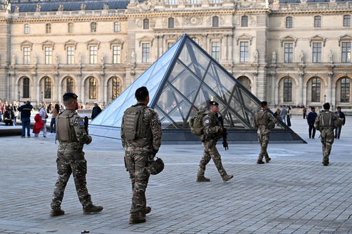 Soldiers patrol in the courtyard of the Louvre museum, Thursday, Oct. 30, 2025 in Paris. (AP Photo/Emma Da Silva) Soldiers patrol in the courtyard of the Louvre museum, Thursday, Oct. 30, 2025 in Paris. (AP Photo/Emma Da Silva)