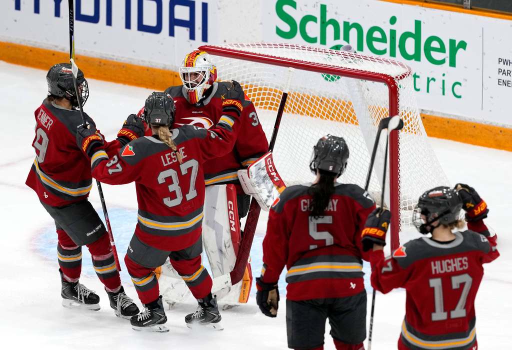 Ottawa Charge goaltender Gwyneth Philips (33) celebrates the team's win against the Vancouver Goldeneyes in PWHL hockey action in Ottawa, on Wednesday, Nov. 26, 2025. (Justin Tang/The Canadian Press via AP)