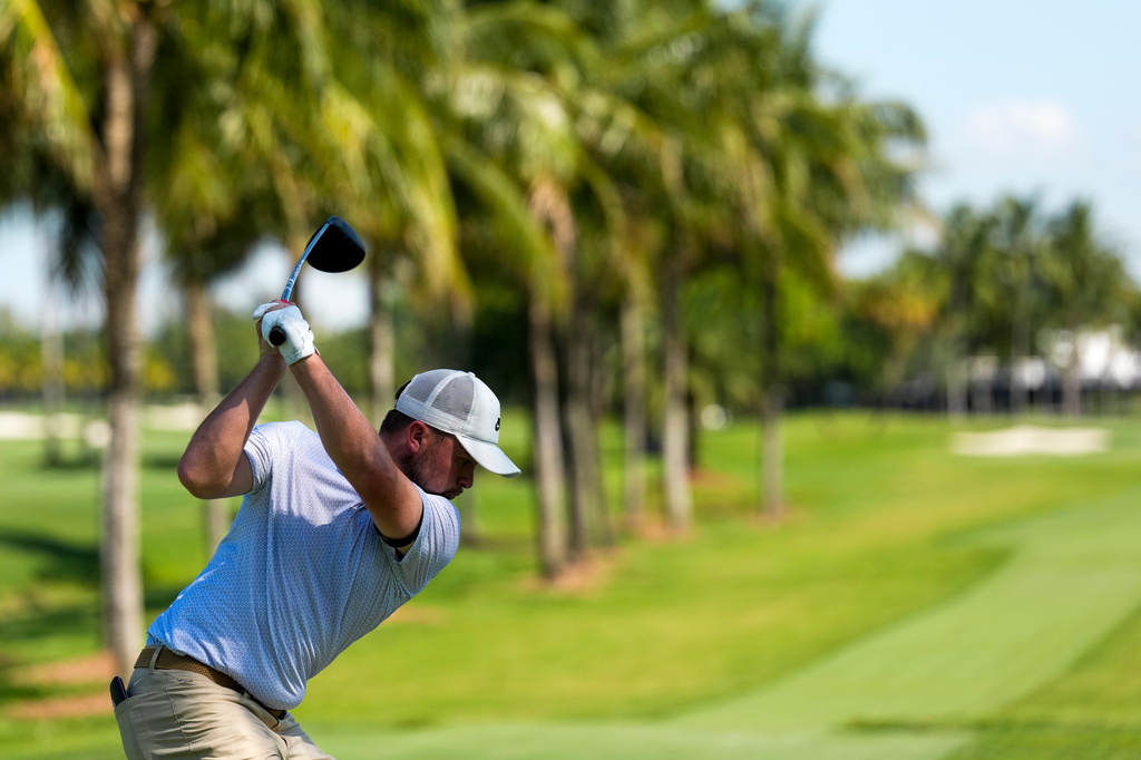 Alex Fitzpatrick, of England, hits from the seance tee during the second round of the Cadillac Championship PGA golf tournament Friday, May 1, 2026, in Doral, Fla. (AP Photo/David J. Phillip)