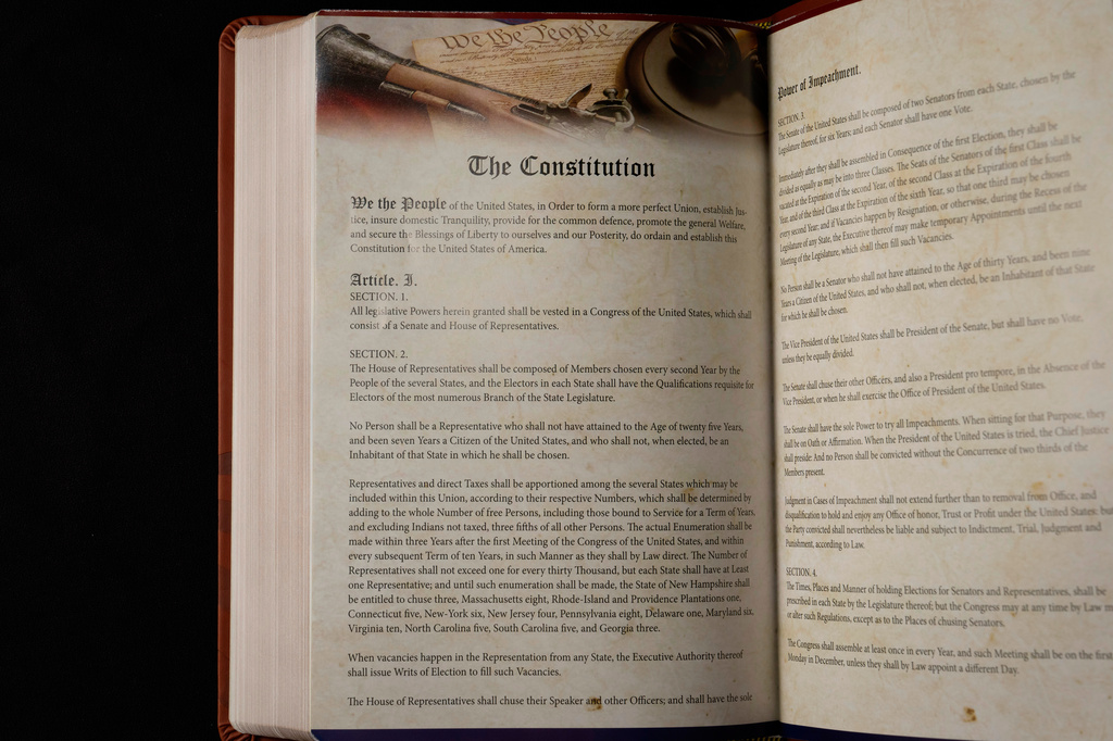 FILE - The Constitution of the United States is printed in Republican presidential nominee former President Donald Trump's "God Bless the USA" Bible in Washington, Oct. 8, 2024. (AP Photo/Ben Curtis, File)
