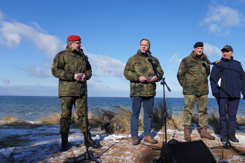 Germany's Defense Minister Boris Pistorius, second left, speaks at a press conference during an amphibious landing operation conducted by the Allied Reaction Force during NATO led military exercises on Wessek Beach in Putlos, Germany, Wednesday, Feb. 18, 2026. (AP Photo/Virginia Mayo)