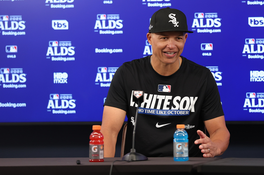 Chicago White Sox manager Will Venable smiles while taking questions in a postgame news conference after a win over the Cleveland Guardians in Game 1 of baseball's American League Division Series, Saturday, Oct. 3, 2026, in Cleveland. (AP Photo/Tim Phillis)