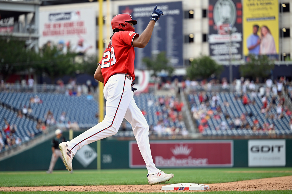 Washington Nationals' James Wood runs around the bases after hitting a solo home run during the eighth inning of a baseball game against the Arizona Diamondbacks, Sunday, July 26, 2026, in Washington. (AP Photo/John McDonnell)