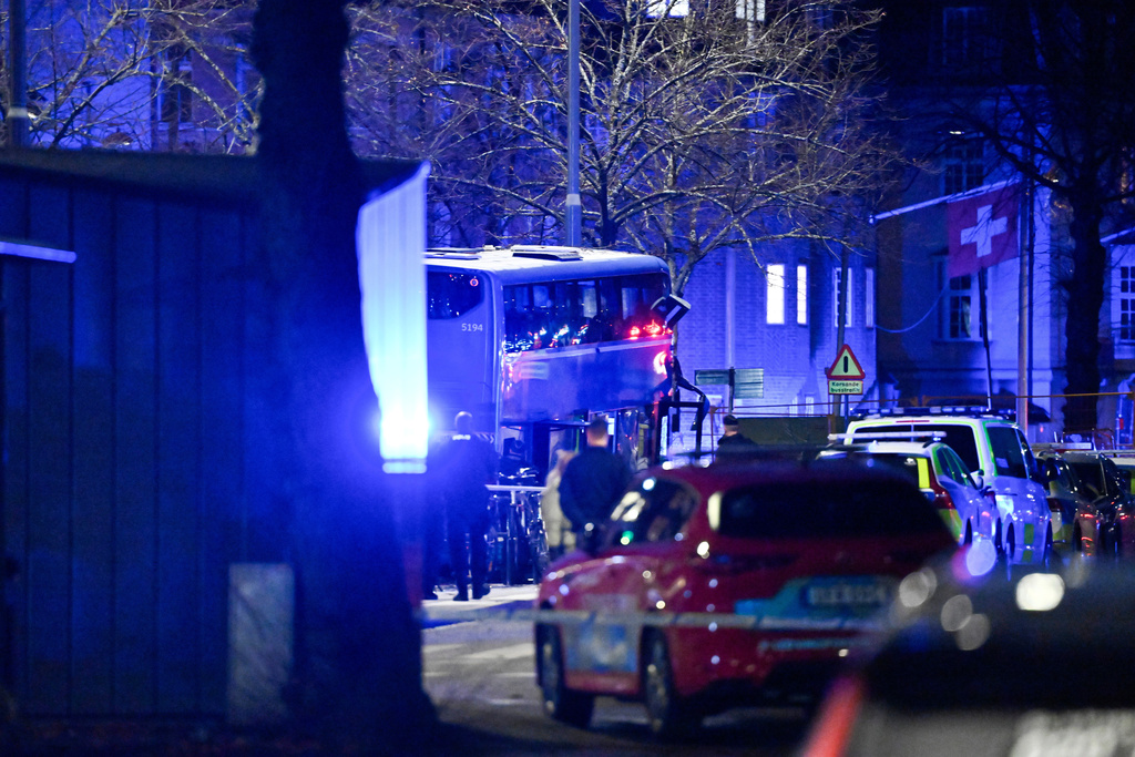 A double-decker bus crashed into a bus shelter in Stockholm on Friday, Nov. 14, 2025, causing fatalities and injuries. (Henrik Montgomery/TT News Agency via AP)