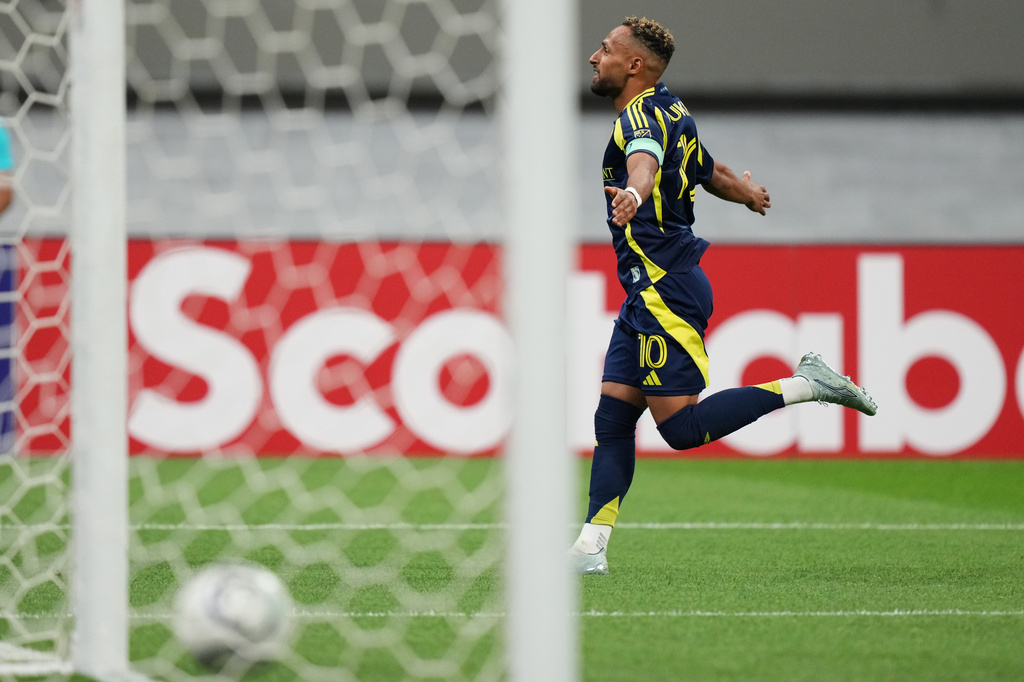 Hany Mukhtar of the United States' Nashville SC celebrates scoring his side's opening goal against Mexico's America during a CONCACAF Champions Cup quarterfinal second leg soccer match in Mexico City, Tuesday, April 14, 2026. (AP Photo/Fernando Llano)