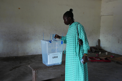A woman casts her vote at a polling station during the presidential elections in Abidjan, Ivory Coast, Saturday, Oct. 25, 2025. (AP Photo/Misper Apawu) A woman casts her vote at a polling station during the presidential elections in Abidjan, Ivory Coast, Saturday, Oct. 25, 2025. (AP Photo/Misper Apawu)
