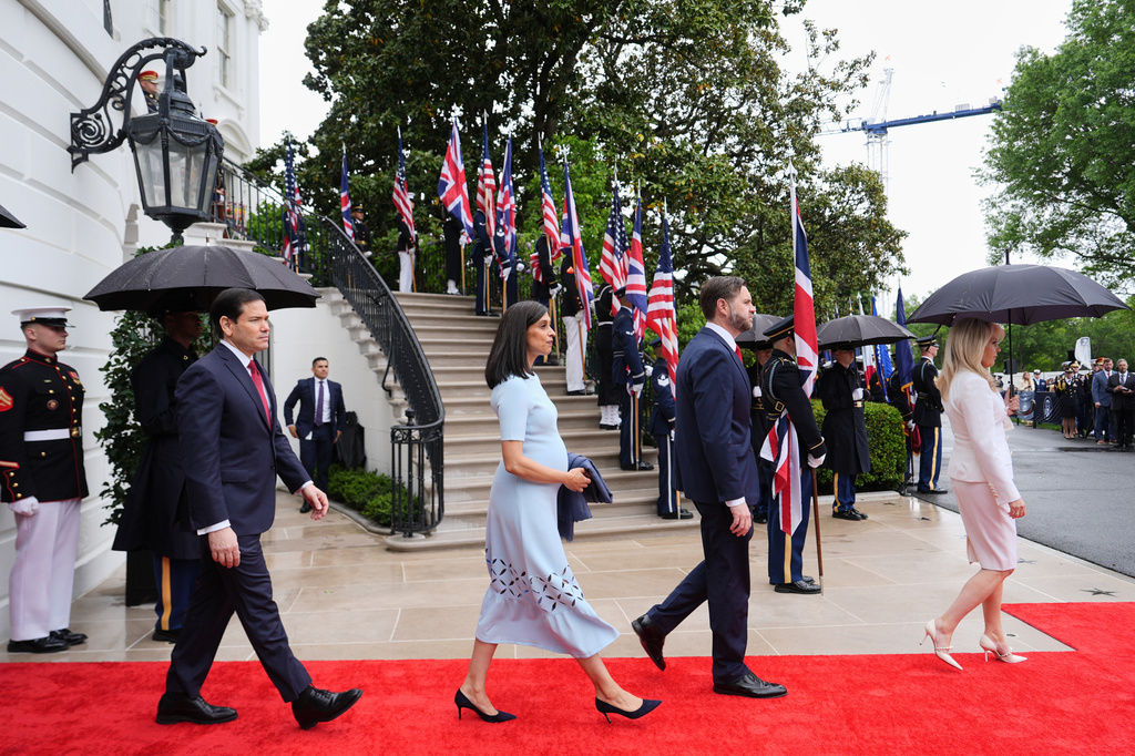Secretary of State Marco Rubio, from left, second lady Usha Vance and Vice President JD Vance arrive with others at an arrival ceremony on the South Lawn of the White House, Tuesday, April 28, 2026, in Washington. (AP Photo/Julia Demaree Nikhinson)