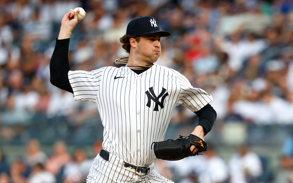 New York Yankees pitcher Cam Schlittler throws against the Cincinnati Reds during the first inning of a baseball game, Friday, June 19, 2026, in New York. (AP Photo/Noah K. Murray)