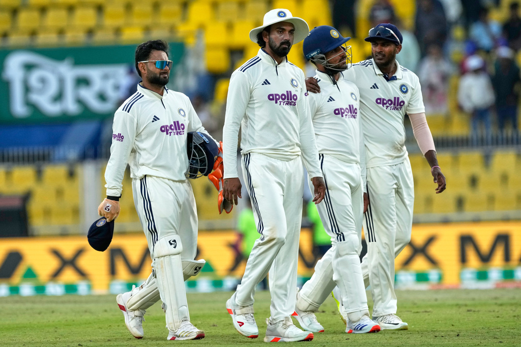 India's players walk off the field at the end of the third day of the second cricket test match between India and South Africa in Guwahati, India, Saturday, Nov. 22, 2025. (AP Photo/Anupam Nath)