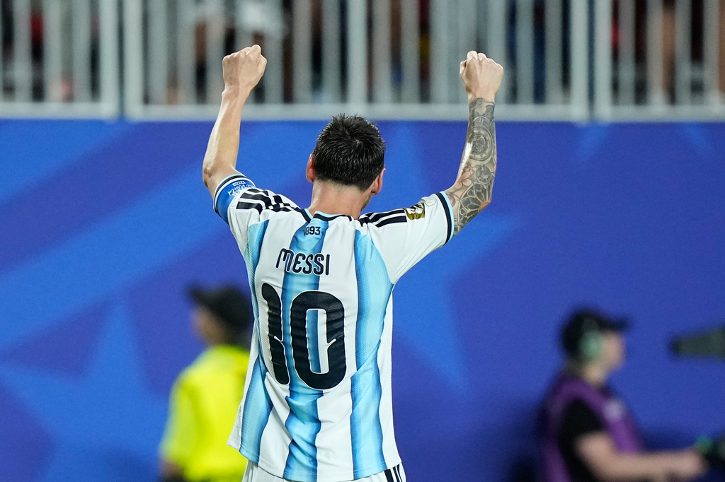 Argentina's Lionel Messi reacts after scoring his third goal during the World Cup Group J soccer match between Argentina and Algeria in Kansas City, Mo., Tuesday, June 16, 2026. (AP Photo/Charlie Riedel)