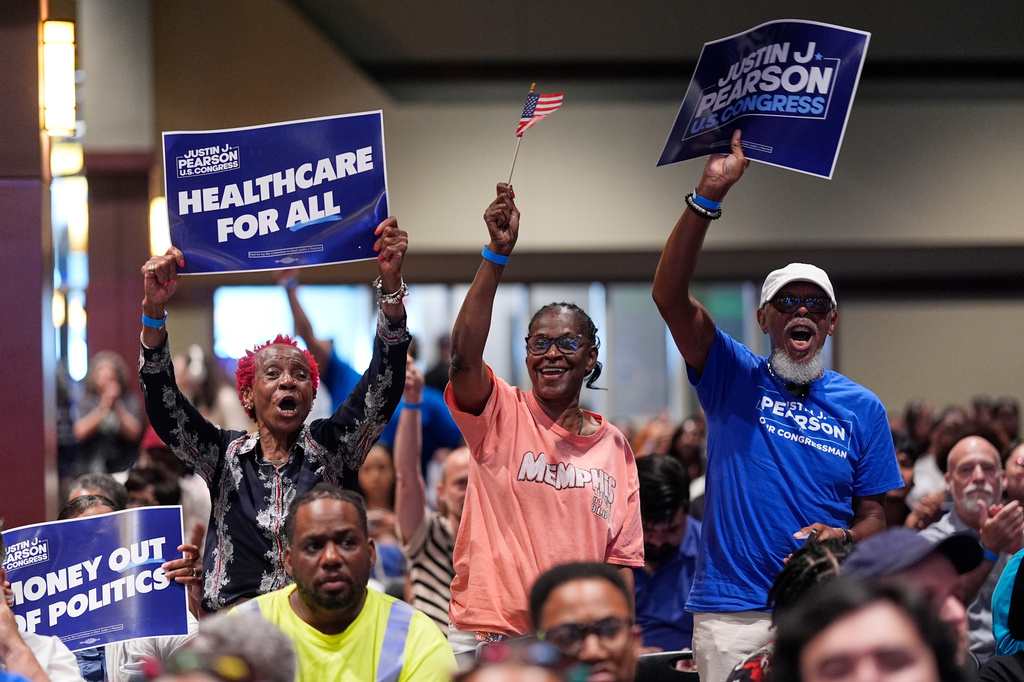 Supporters of Democratic congressional candidate State Rep. Justin J. Pearson, D-Memphis, cheer during a campaign rally, Friday, July 17, 2026, in Memphis, Tenn. (AP Photo/George Walker IV)