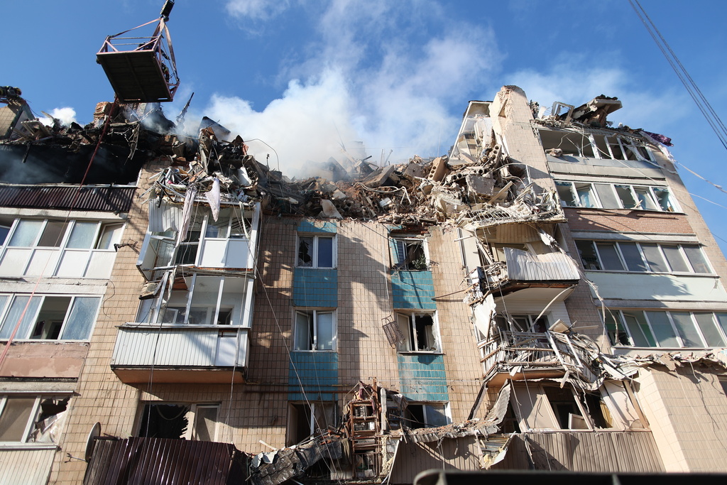 FILE - Rescue workers clear the rubble of a residential building which was heavily damaged by a Russian strike on Ternopil, Ukraine, Nov. 19, 2025. (AP Photo/Vlad Kravchuk, file)