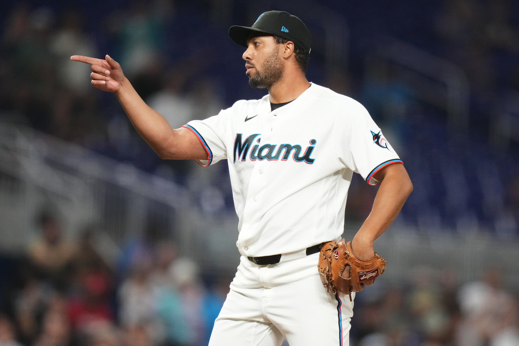 Miami Marlins relief pitcher Michael Petersen reacts after getting the final out during the ninth inning of a baseball game against the Cincinnati Reds, Wednesday, April 8, 2026, in Miami. (AP Photo/Lynne Sladky)