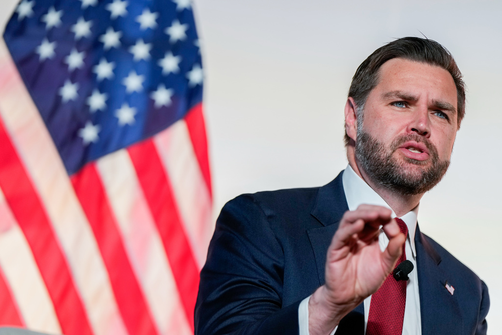 Vice President JD Vance speaks with Breitbart News Washington bureau chief Matthew Boyle at Andrew W. Mellon Auditorium, Thursday, Nov. 20, 2025, in Washington. (AP Photo/Julia Demaree Nikhinson)