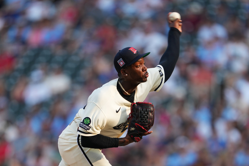 Minnesota Twins pitcher Kendry Rojas throws to the Athletics during the first inning of a baseball game, Saturday, July 25, 2026, in Minneapolis. (AP Photo/Ellen Schmidt)