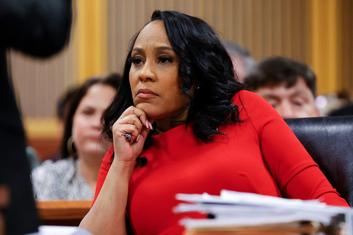 FILE - Fulton County District Attorney Fani Willis looks on during a hearing on the Georgia election interference case, Friday, March, 1, 2024, in Atlanta. (AP Photo/Alex Slitz, Pool, File) FILE - Fulton County District Attorney Fani Willis looks on during a hearing on the Georgia election interference case, Friday, March, 1, 2024, in Atlanta. (AP Photo/Alex Slitz, Pool, File)