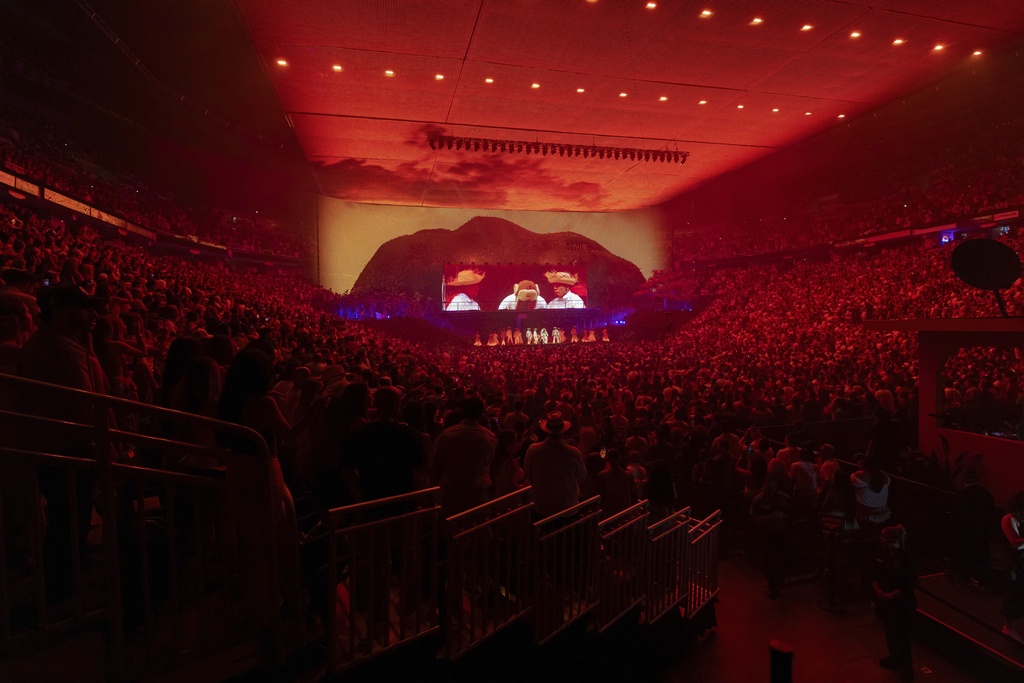 Bad Bunny performs during the final concert of his summer residency in his homeland at the Coliseo de Puerto Rico Jose Miguel Agrelot, in San Juan, Puerto Rico, Saturday, Sept. 20, 2025. (AP Photo/Alejandro Granadillo)