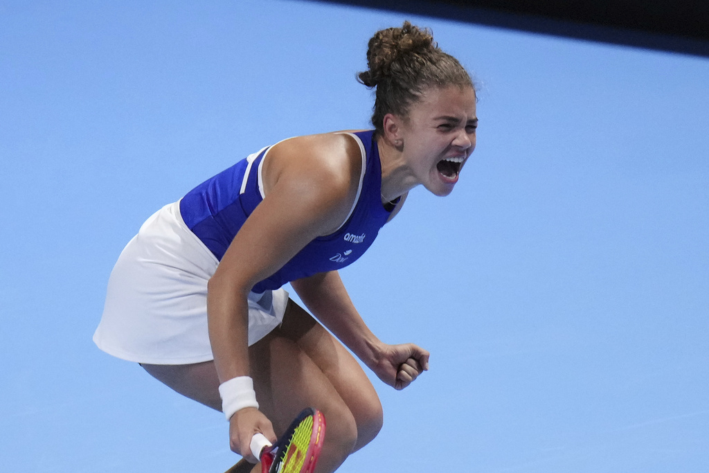 Jasmine Paolini, of Italy celebrates after defeating Elina Svitolina, of Ukraine in the Billie Jean King Cup semifinals tennis match, at the Shenzhen Bay Sports Center Arena, in Shenzhen, China's Guangdong province, Friday, Sept. 19, 2025. (AP Photo/Andy Wong)