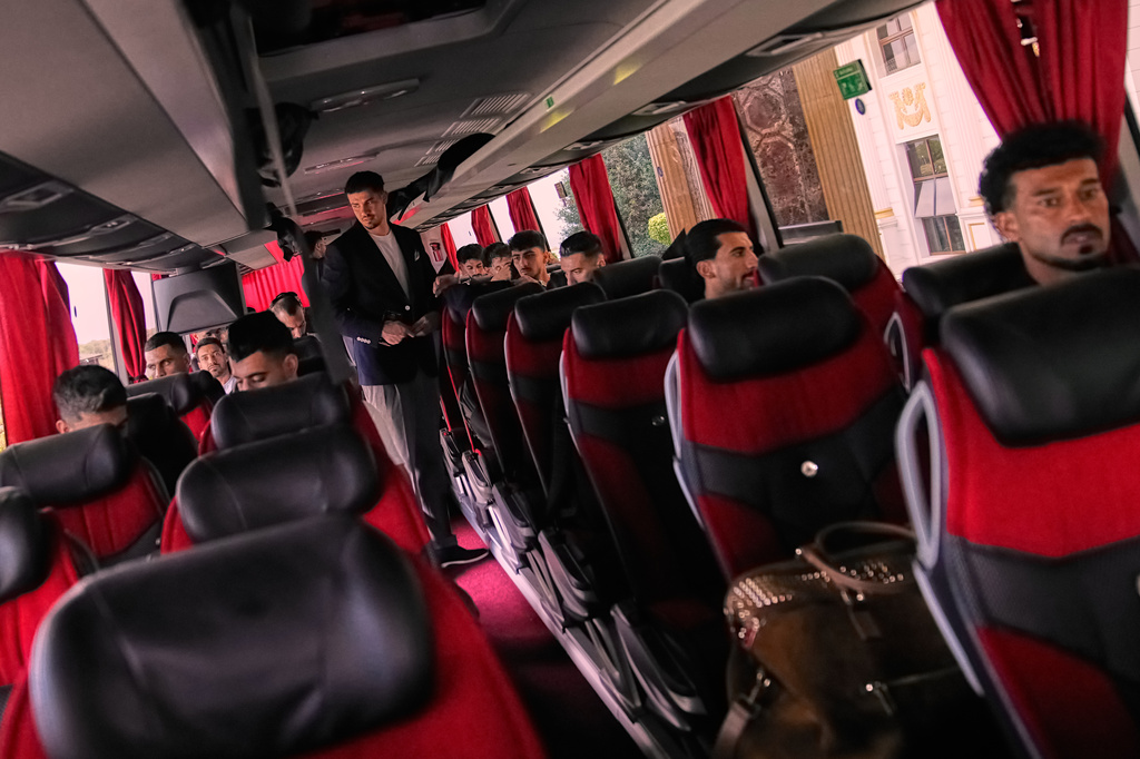 Iran's players get onboard a bus as they leave to Antalya airport, southern Turkey, Saturday, June 6, 2026, before departing to Tijuana, Mexico, for the World Cup soccer tournament. (AP Photo/Khalil Hamra)