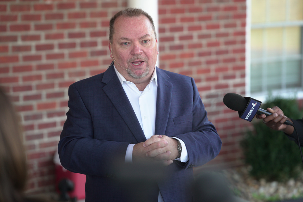 Tim Farris, Hurricane Chapel senior pastor, speaks to the press after a vigil at his church in McEwen, Tenn., on Saturday, Oct. 11, 2025, for victims of a blast that leveled an explosives plant. (AP Photo/Obed Lamy)