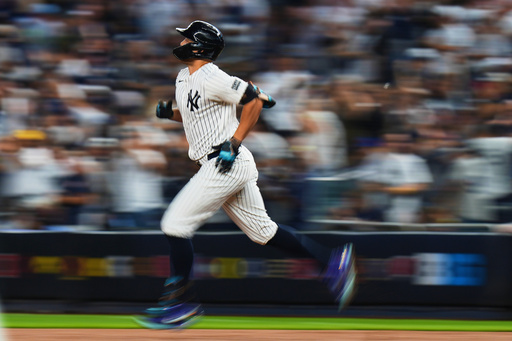 New York Yankees' Giancarlo Stanton runs the bases after hitting a two-run home run during the first inning of a baseball game against the Baltimore Orioles Friday, Sept. 26, 2025, in New York. (AP Photo/Frank Franklin II) New York Yankees' Giancarlo Stanton runs the bases after hitting a two-run home run during the first inning of a baseball game against the Baltimore Orioles Friday, Sept. 26, 2025, in New York. (AP Photo/Frank Franklin II)