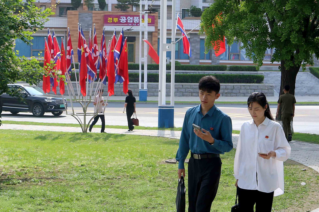 A street is decorated with the flags of China and North Korea in Pyongyang, Monday, June 8, 2026. (AP Photo/Jon Chol Jin)