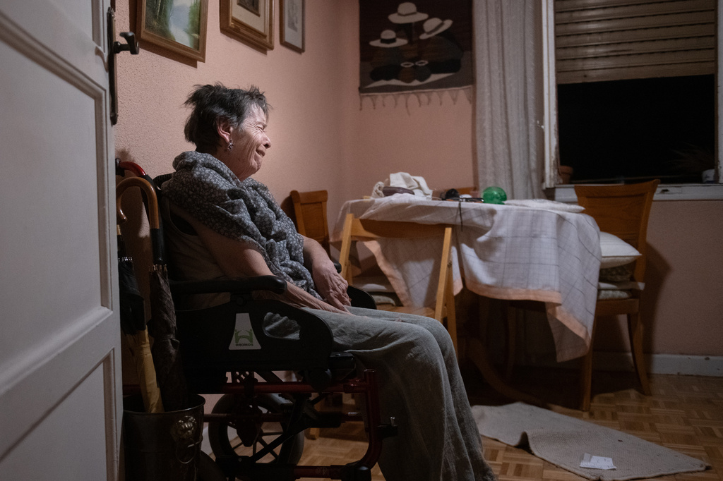 Maricarmen, 87, waits at home for police to arrive before being evicted from the home where she lived in Madrid, Spain, Wednesday, Sept. 23, 2026. (Fernando Sánchez/Europa Press via AP)