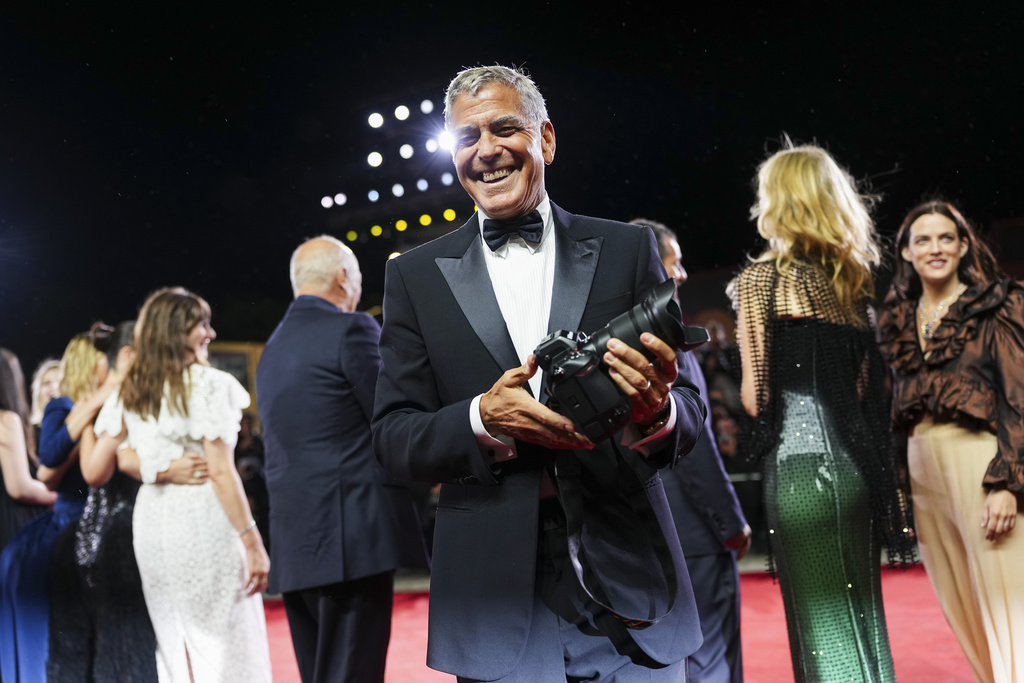George Clooney poses for photographers at the red carpet for the film 'Jay Kelly' during the 82nd edition of the Venice Film Festival in Venice, Italy, on Thursday, Aug. 28, 2025. (Photo by Scott A Garfitt/Invision/AP)