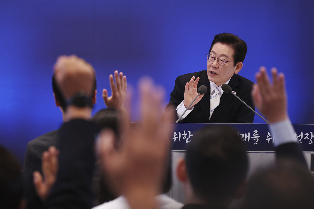 South Korean President Lee Jae Myung takes questions during a news conference to mark 100 days in office at the Blue House in Seoul, South Korea, Sept, 11, 2025. (Kim Hong-Ji/Pool Photo via AP)