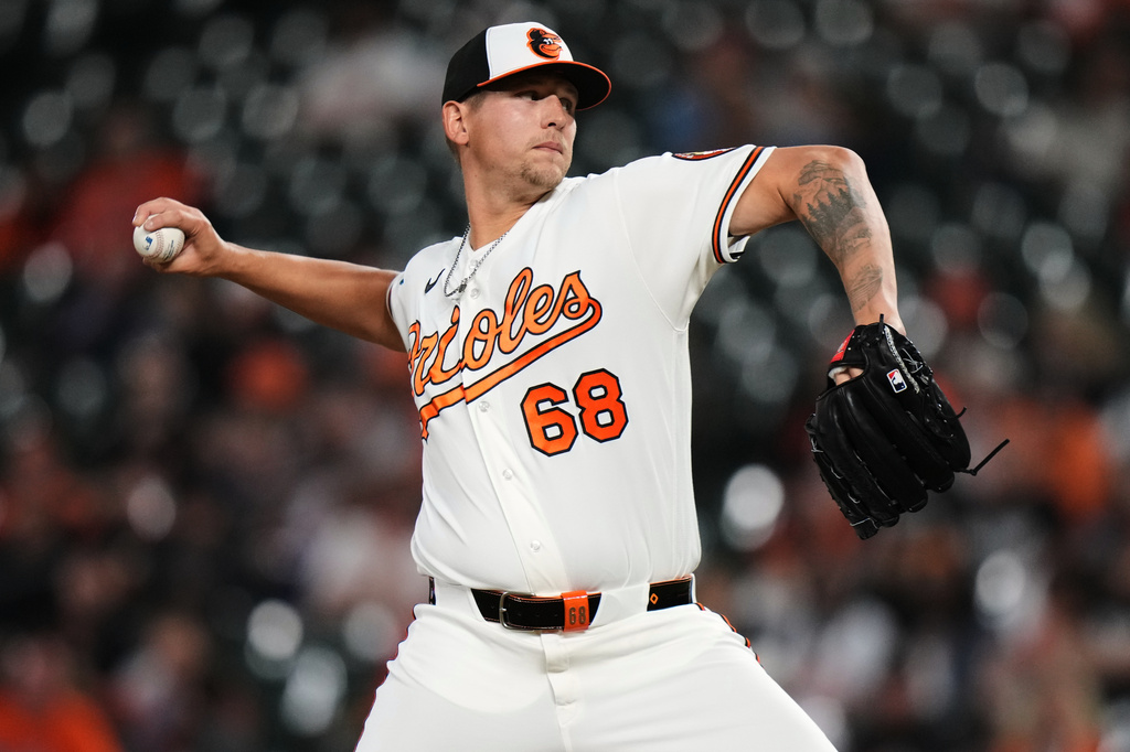 Baltimore Orioles pitcher Tyler Wells delivers during the ninth inning of a baseball game against the Texas Rangers, Monday, March 30, 2026, in Baltimore. (AP Photo/Stephanie Scarbrough)