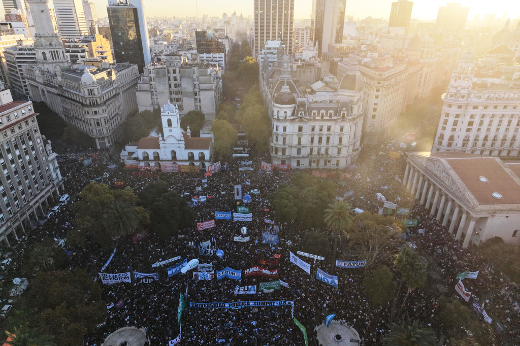 People protest to demand more fundings for public universities in Buenos Aires, Argentina, Tuesday, May 12, 2026. (AP Photo/Rodrigo Abd)