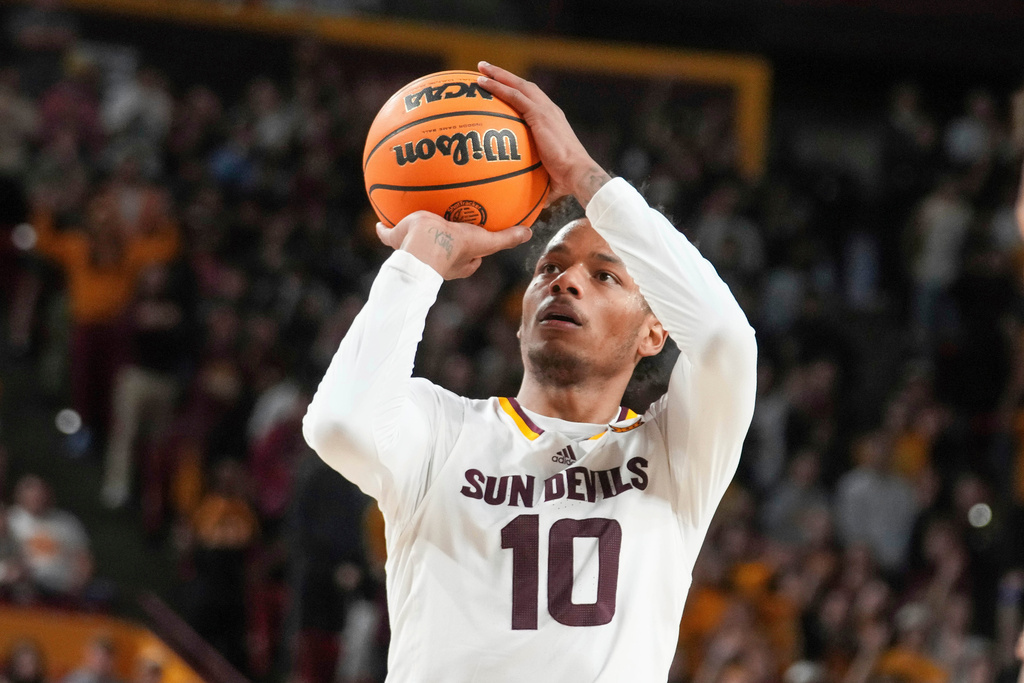 FILE - Arizona State guard BJ Freeman (10) shoots during the first half of an NCAA college basketball game against Iowa State, Saturday, Jan. 25, 2025, in Tempe, Ariz. (AP Photo/Darryl Webb)