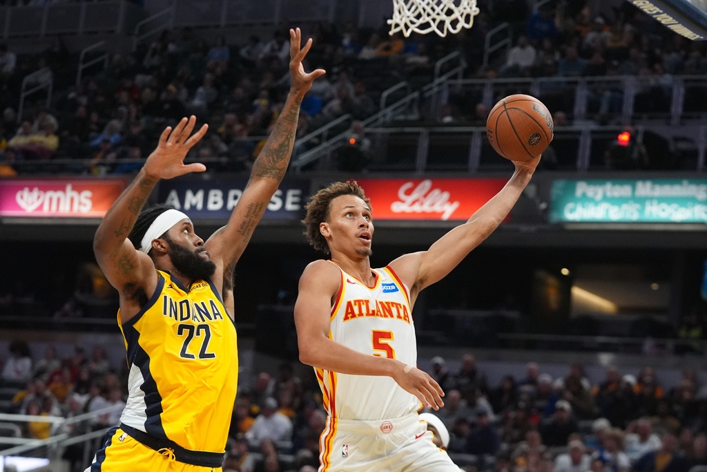 Atlanta Hawks' Dyson Daniels (5) looks to shoot against Indiana Pacers' Isaiah Jackson (22) during the second half of an NBA Cup basketball game, Friday, Oct. 31, 2025, in Indianapolis. (AP Photo/Darron Cummings)