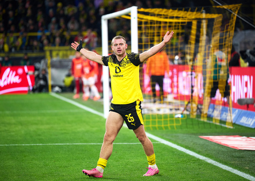 Dortmund's Julian Ryerson reacts during the Bundesliga soccer match between Borussia Dortmund and 1. FC Köln, in Dortmund, Germany, Saturday Oct. 25, 2025. (Bernd Thissen/dpa via AP) Dortmund's Julian Ryerson reacts during the Bundesliga soccer match between Borussia Dortmund and 1. FC Köln, in Dortmund, Germany, Saturday Oct. 25, 2025. (Bernd Thissen/dpa via AP)
