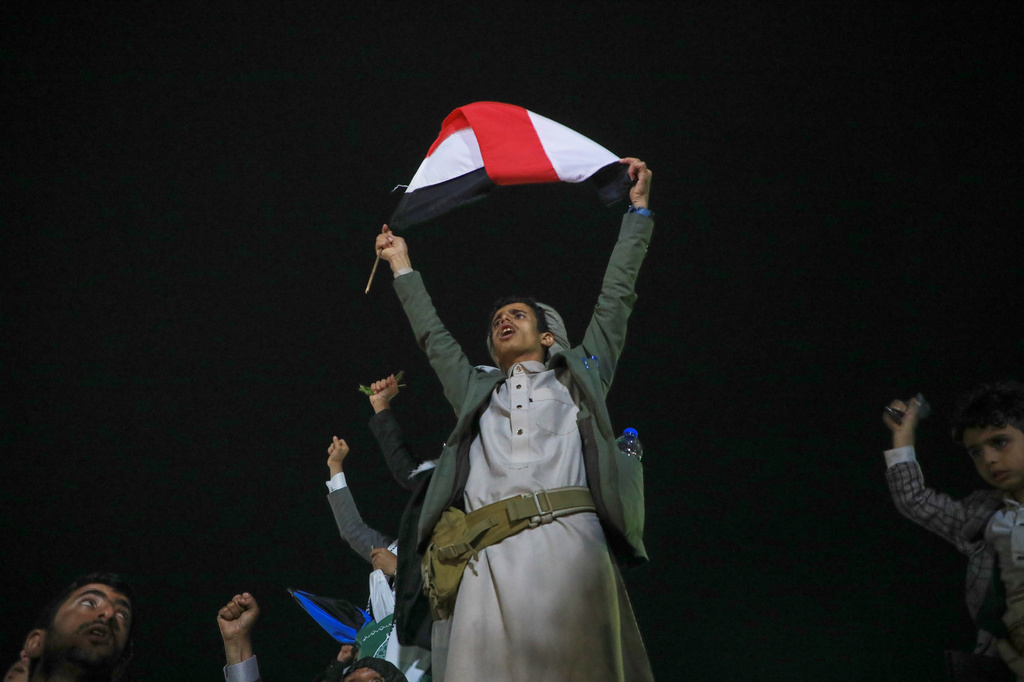 Supporters celebrate as they attend a rally organized by Yemen's Houthi rebels to celebrate the group's capture of Mayun Island in the strategic Bab el-Mandeb Strait, in Houthi-controlled Sanaa, Yemen, Friday, Sept. 11, 2026. (AP Photo/Osamah Abdulrahman)