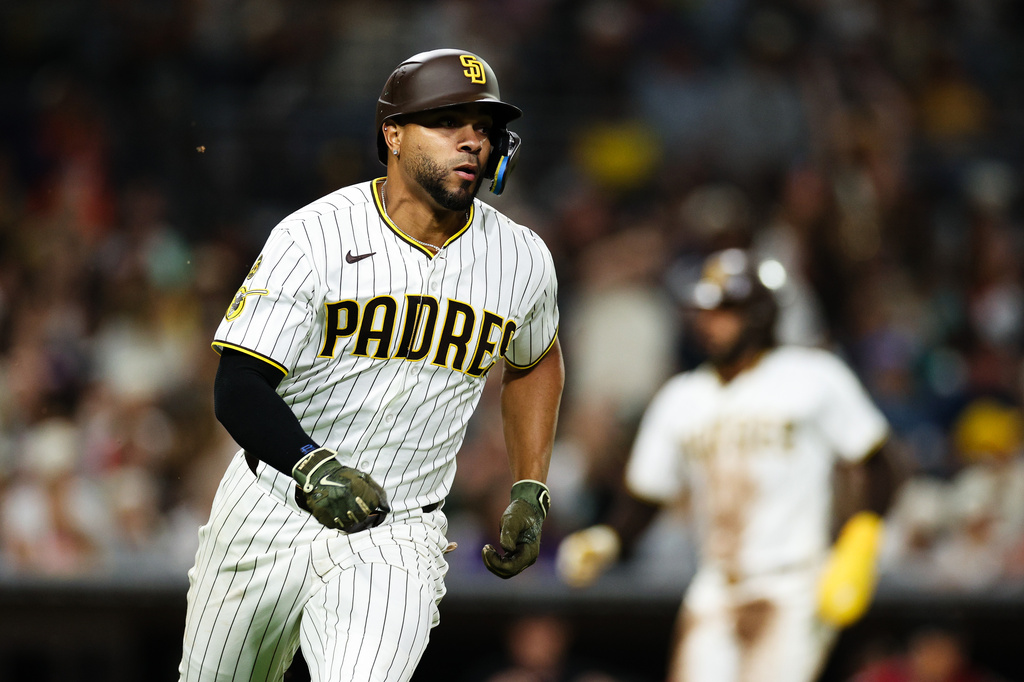 San Diego Padres' Xander Bogaerts runs the bases after hitting a two-RBI single against the Arizona Diamondbacks in the fifth inning of a baseball game Wednesday, July 8, 2026, in San Diego. (AP Photo/Derrick Tuskan)
