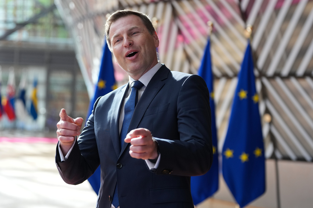Estonia's Defense Minister Hanno Pevkur speaks with the media as he arrives for a meeting of EU defense ministers at the European Council building in Brussels, Tuesday, May 12, 2026. (AP Photo/Virginia Mayo)