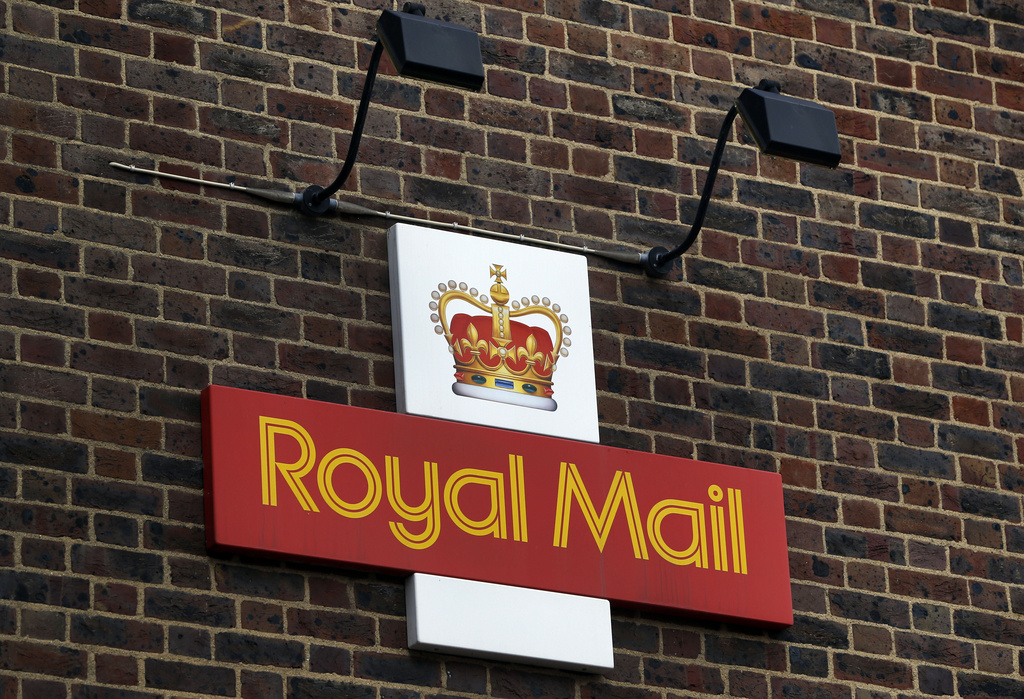 FILE - A Royal Mail Post Office is seen in London, Thursday, Oct. 10, 2013. (AP Photo/Lefteris Pitarakis, file)