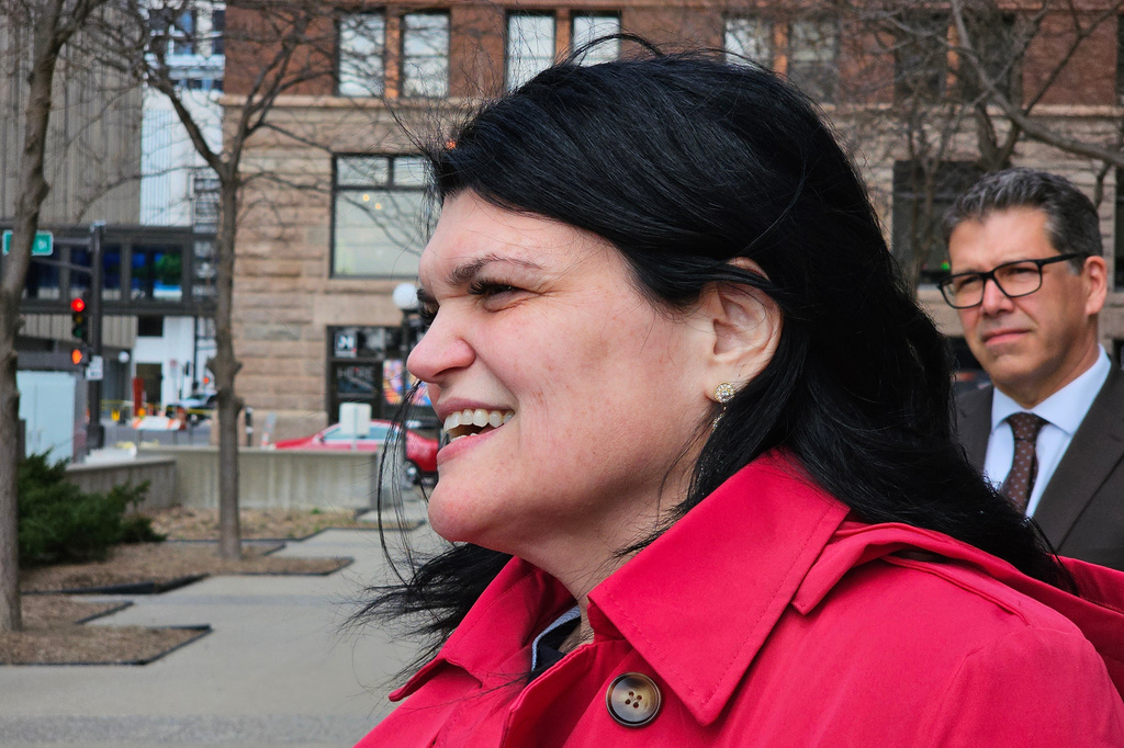 Fridley Public Schools Superintendent Brenda Lewis speaks with reporters outside the federal courthouse in St. Paul, Minn., Wednesday, April 8, 2026, after a hearing on a lawsuit by the Fridley and Duluth school districts and the Education Minnesota teachers union that seeks to block a Trump administration change in policy that gave immigration authorities a freer hand to conduct enforcement actions in and near schools. (AP Photo/Steve Karnowski)