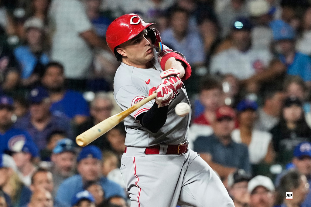 Cincinnati Reds' Sal Stewart hits a solo home run during the seventh inning of a baseball game against the Chicago Cubs in Chicago, Sunday, Aug. 30, 2026. (AP Photo/Nam Y. Huh)