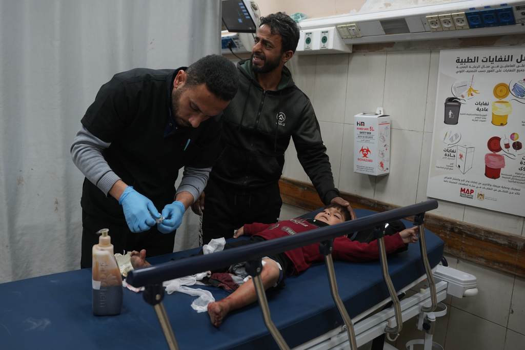 An injured child is treated at Nasser Hospital, following an Israeli military strike in Khan Younis, Gaza Strip, Friday, Feb. 27, 2026. (AP Photo/Abdel Kareem Hana)
