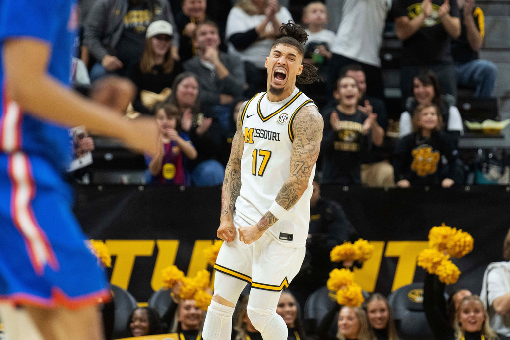 Missouri's Jayden Stone (17) celebrates after a basket during the first half of an NCAA basketball game against Florida, Saturday, Jan. 3, 2026, in Columbia, Mo. (AP Photo/L.G. Patterson)