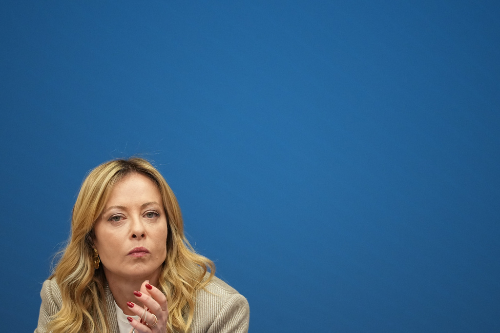 Italian Prime Minister Giorgia Meloni holds her annual start-of-the-year press conference in the press room at the Lower Chamber, in Rome, Friday, Jan. 9, 2026. (AP Photo/Andrew Medichini)