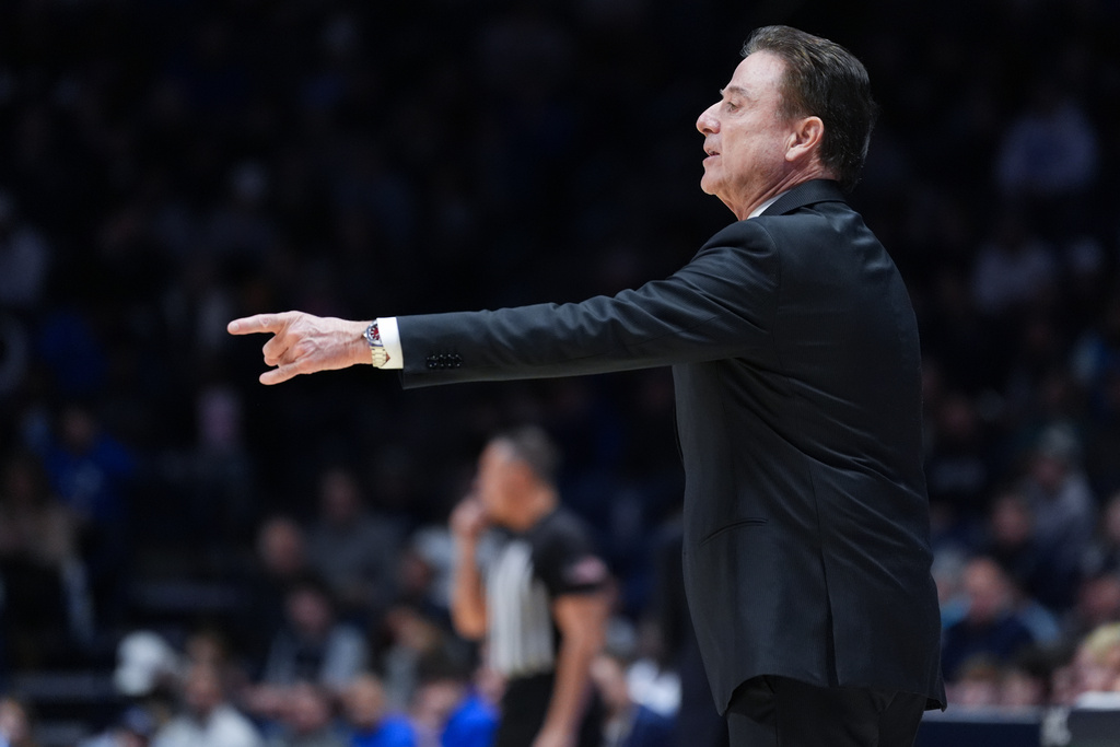 St. John's head coach Rick Pitino instructs the team during the first half of a college basketball game against Xavier, Saturday, Jan. 24, 2026, in Cincinnati. (AP Photo/Kareem Elgazzar)