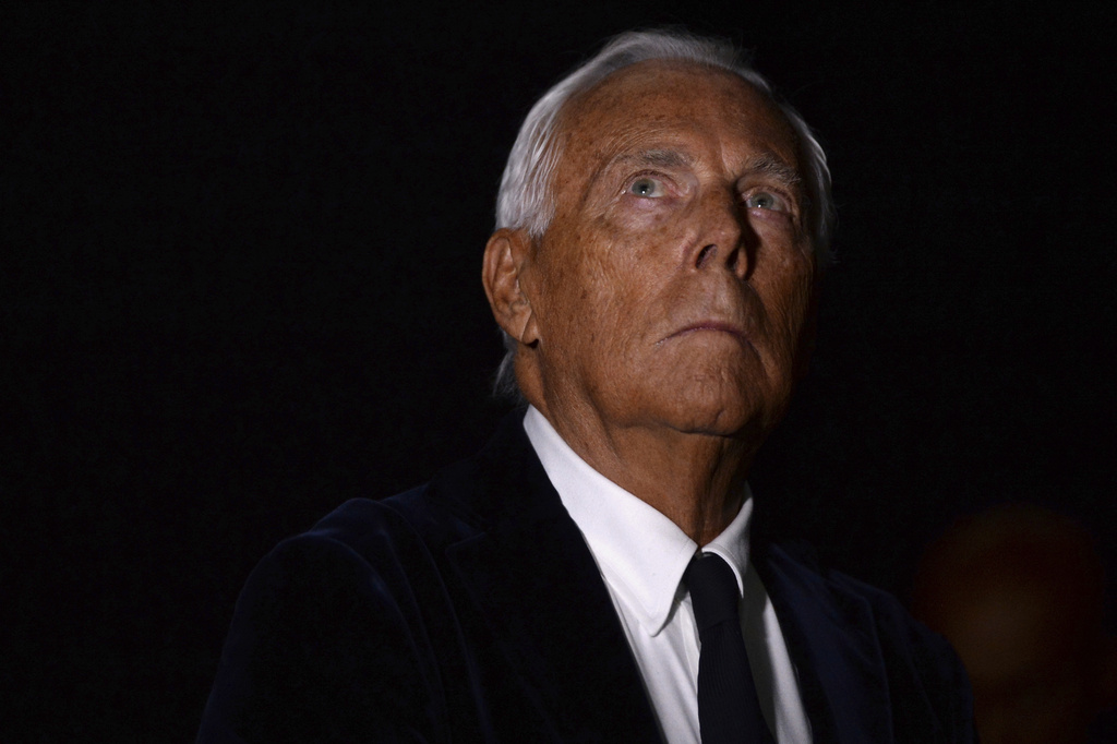 FILE - Italian designer Giorgio Armani attends his Haute Couture Fall Winter 2016/17 collection show in Moscow, Russia, April 14, 2016. (AP Photo/ Pavel Bednyakov, File)