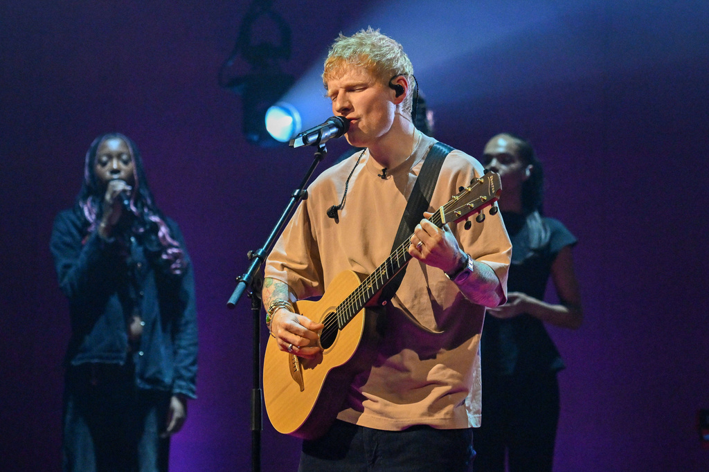 Ed Sheeran performs during filming for the Graham Norton Show, at BBC Studioworks 6 Television Centre, Wood Lane, in London, Thursday, Nov. 6, 2025, to be aired on BBC One on Friday evening. (Jas Lehal/PA via AP)
