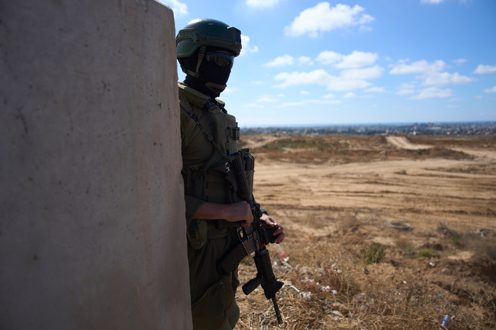 An Israeli soldier occupies a military position overlooking the so-called Yellow Line in the central Gaza Strip, Tuesday, May 26, 2026. (AP Photo/Ariel Schalit)